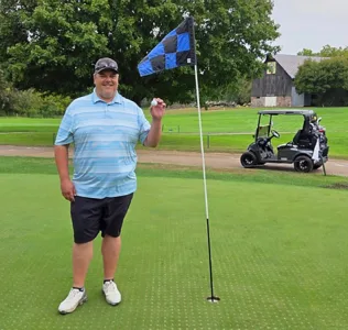 Postel sinks hole-in-one